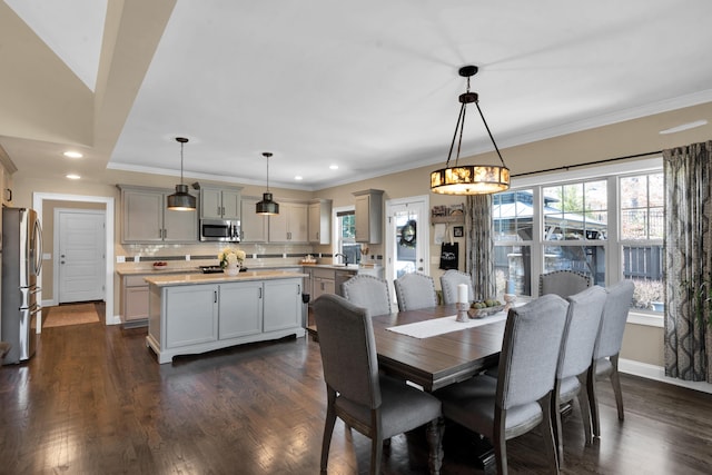 dining area featuring recessed lighting, ornamental molding, baseboards, and dark wood-style flooring