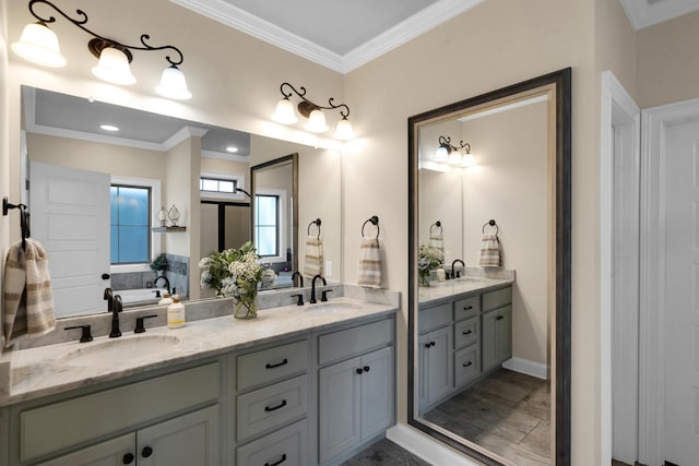 full bath featuring a sink, ornamental molding, and double vanity