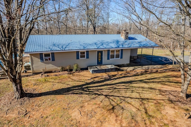 ranch-style house with a front lawn