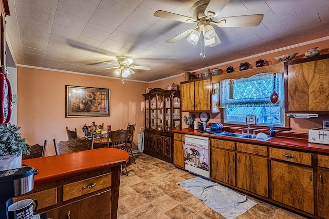 kitchen featuring sink, dishwasher, ceiling fan, and crown molding