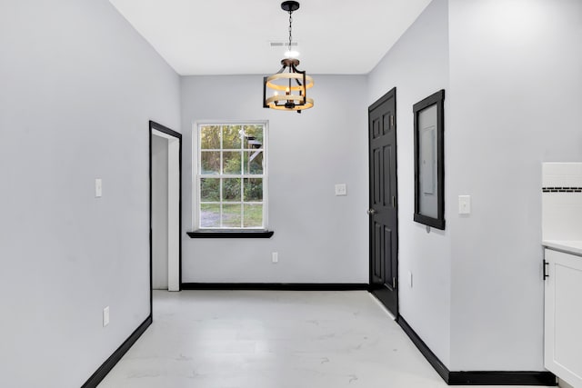 interior space featuring an inviting chandelier