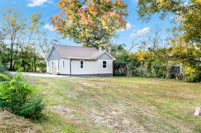 exterior space with a lawn