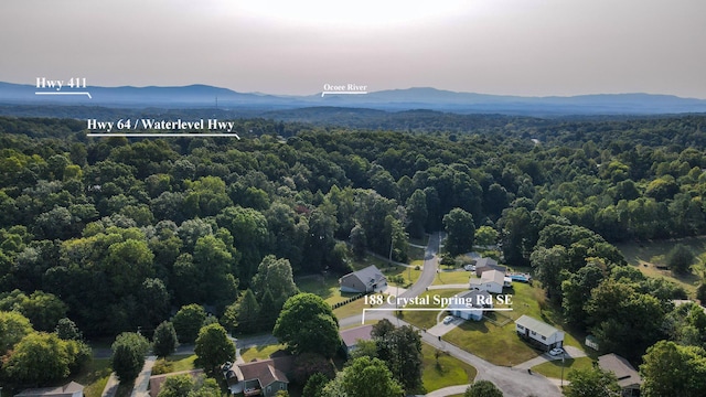 birds eye view of property featuring a mountain view