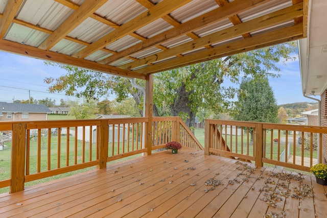 wooden terrace with a yard