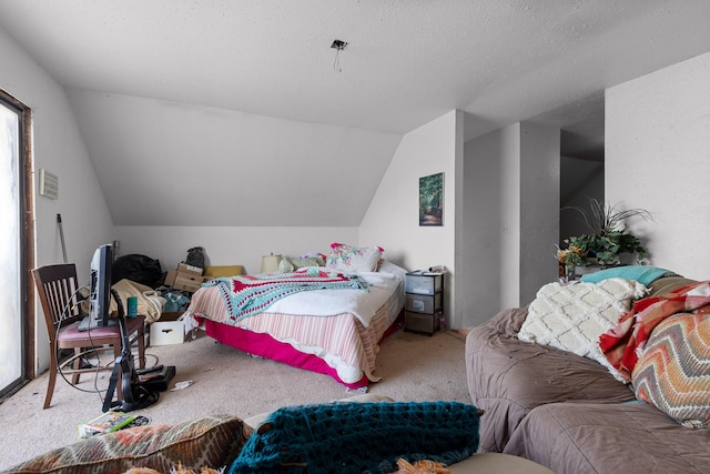 bedroom featuring light colored carpet and vaulted ceiling