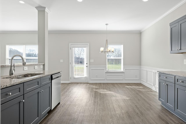 kitchen featuring dishwasher, gray cabinets, light stone counters, and sink