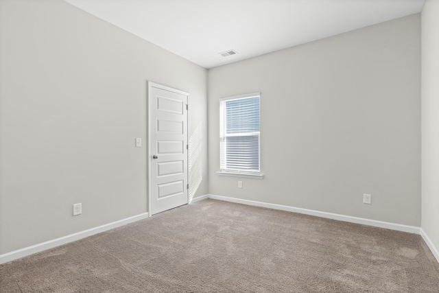 spare room with carpet flooring