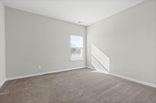 view of carpeted spare room