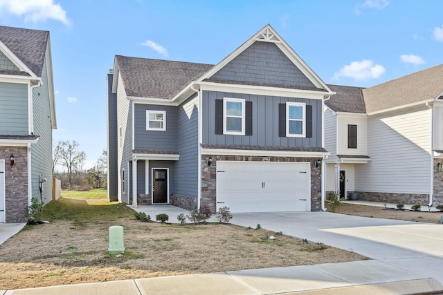 craftsman house with a garage