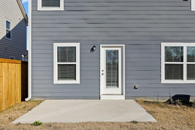 doorway to property featuring a patio area