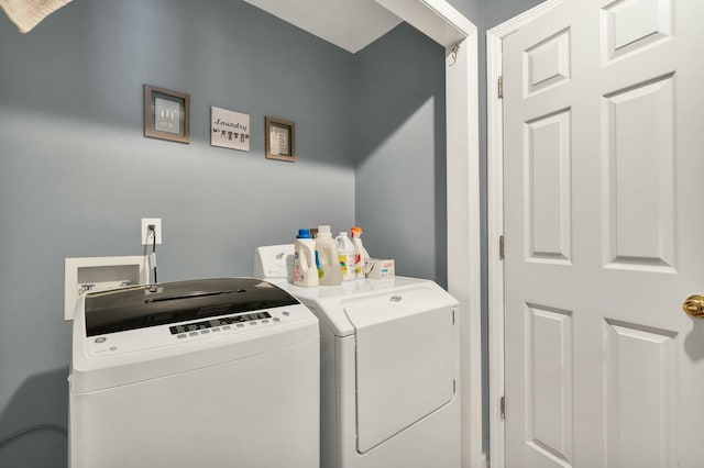 laundry area featuring laundry area and washer and dryer