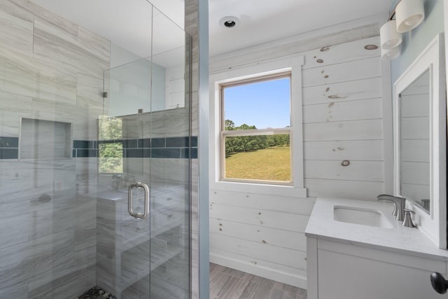 7105 Toestring Valley Rd, Spring City, TN 37381 - bathroom with vanity, a stall shower, and wood finished floors