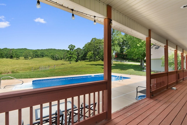 7105 Toestring Valley Rd, Spring City, TN 37381 - wooden deck featuring an outdoor pool, a lawn, and a forest view