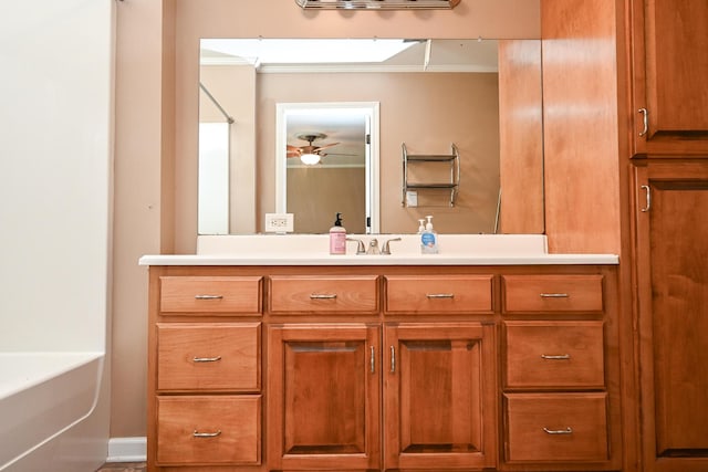 bathroom featuring vanity and ceiling fan