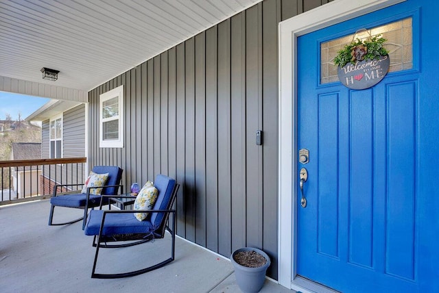 property entrance with covered porch