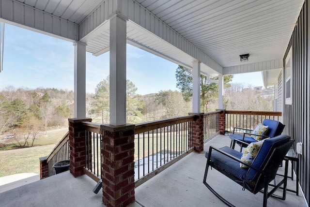 exterior space featuring covered porch and cooling unit