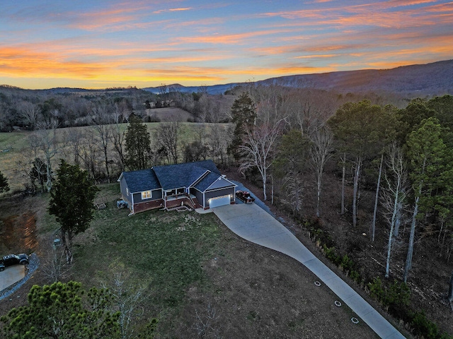 drone / aerial view featuring a mountain view