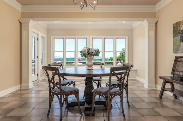 tiled dining area with decorative columns, a wealth of natural light, and a chandelier