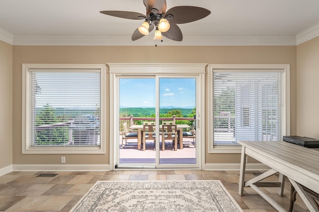 doorway to outside featuring ceiling fan, a healthy amount of sunlight, and ornamental molding