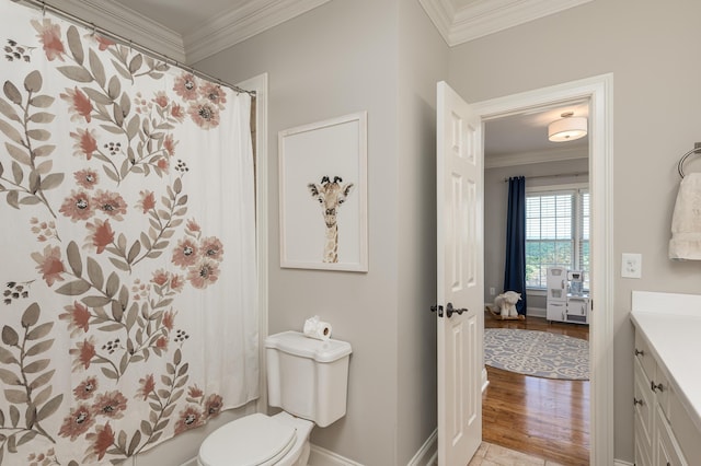 full bathroom featuring vanity, toilet, ornamental molding, and shower / tub combo with curtain