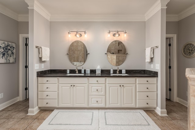 bathroom with tile patterned floors, vanity, and ornamental molding