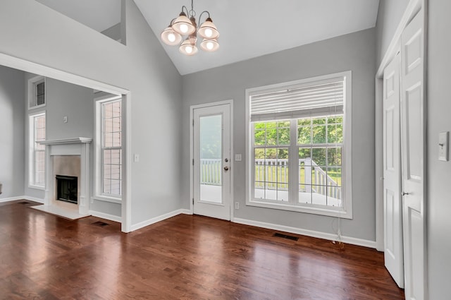 1031 Laurel Hill Dr, Dickson, TN 37055 - doorway featuring wood finished floors, a chandelier, baseboards, a high end fireplace, and high vaulted ceiling