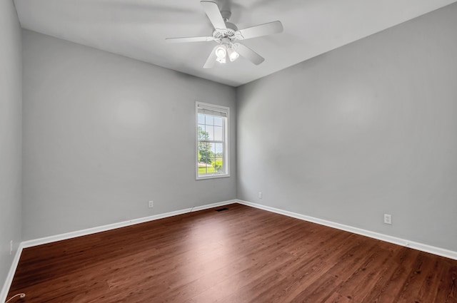 1031 Laurel Hill Dr, Dickson, TN 37055 - empty room featuring baseboards, dark wood-style flooring, and a ceiling fan
