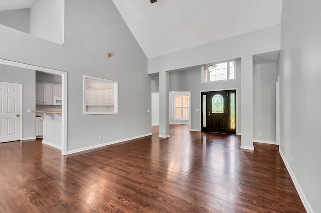 1031 Laurel Hill Dr, Dickson, TN 37055 - entryway with high vaulted ceiling, dark wood-style flooring, and baseboards