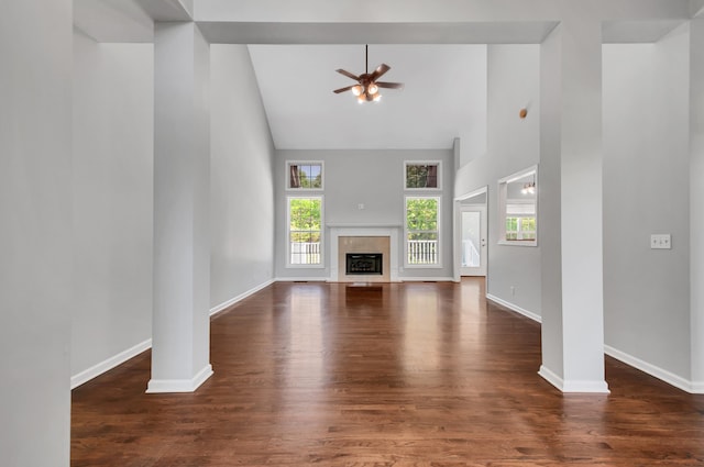 1031 Laurel Hill Dr, Dickson, TN 37055 - unfurnished living room with high vaulted ceiling, ceiling fan, wood finished floors, and baseboards
