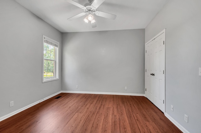 1031 Laurel Hill Dr, Dickson, TN 37055 - empty room with wood finished floors, baseboards, and ceiling fan