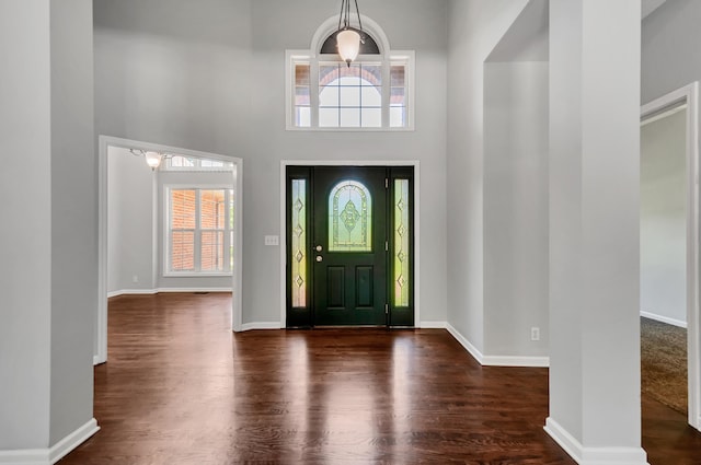 1031 Laurel Hill Dr, Dickson, TN 37055 - foyer featuring healthy amount of natural light, dark wood-type flooring, a high ceiling, and baseboards