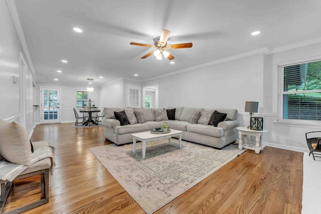 6833 Buck Trail Dr, Harrison, TN 37341 - living room featuring crown molding, recessed lighting, a ceiling fan, light wood-style floors, and baseboards