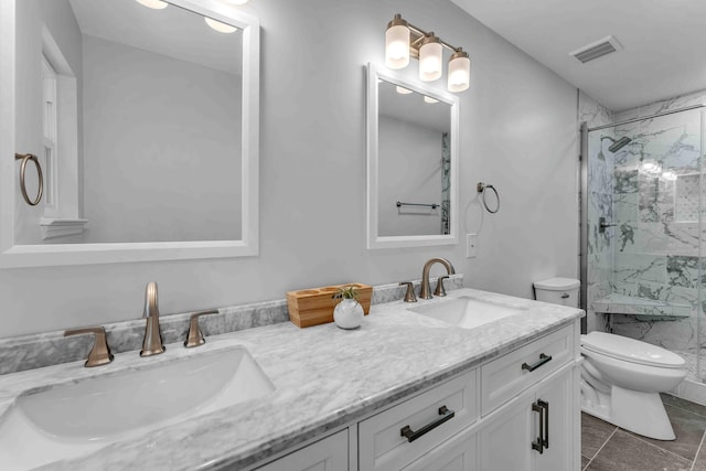 6833 Buck Trail Dr, Harrison, TN 37341 - full bath with toilet, double vanity, a marble finish shower, and tile patterned floors