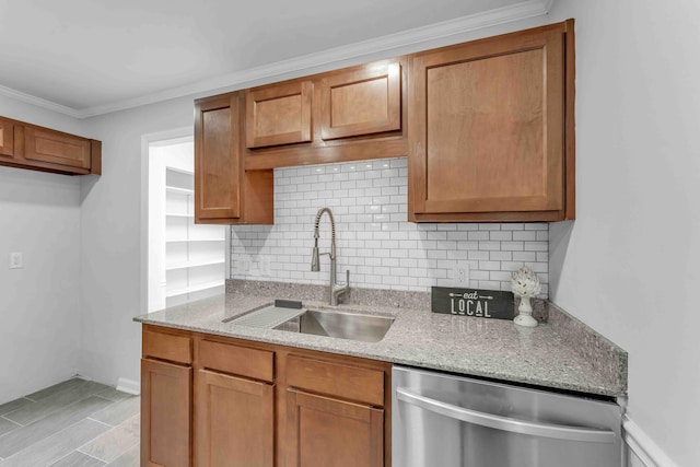 6833 Buck Trail Dr, Harrison, TN 37341 - kitchen featuring dishwasher, a sink, tasteful backsplash, light stone counters, and ornamental molding