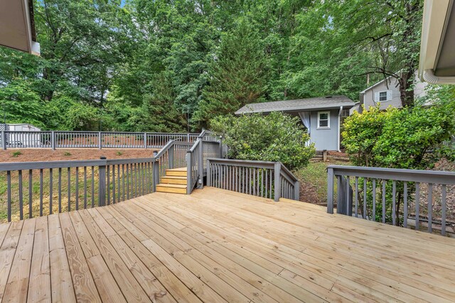 6833 Buck Trail Dr, Harrison, TN 37341 - wooden deck with an outdoor structure