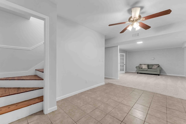 6833 Buck Trail Dr, Harrison, TN 37341 - basement featuring a ceiling fan, light colored carpet, baseboards, and light tile patterned floors