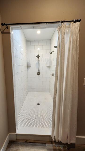 bathroom featuring walk in shower