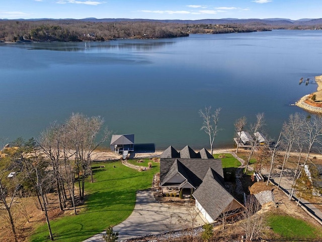 drone / aerial view with a water view