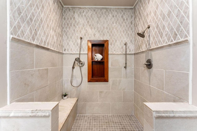 bathroom featuring tiled shower