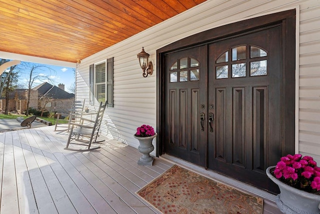 doorway to property with a porch