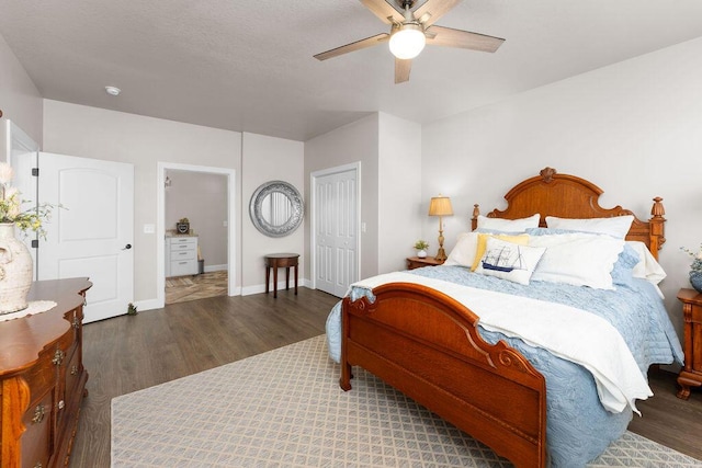 bedroom featuring dark hardwood / wood-style flooring, a closet, and ceiling fan