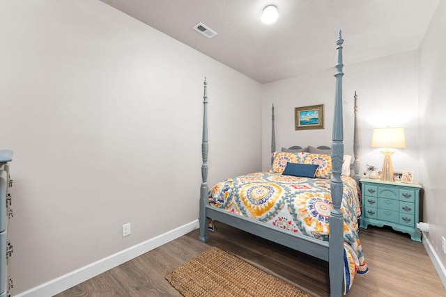 bedroom featuring hardwood / wood-style floors