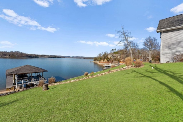 exterior space with a water view