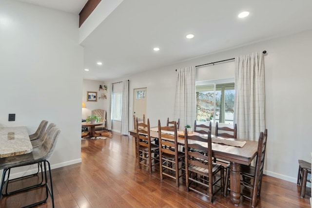 dining space featuring dark hardwood / wood-style flooring