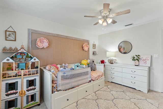 carpeted bedroom with ceiling fan