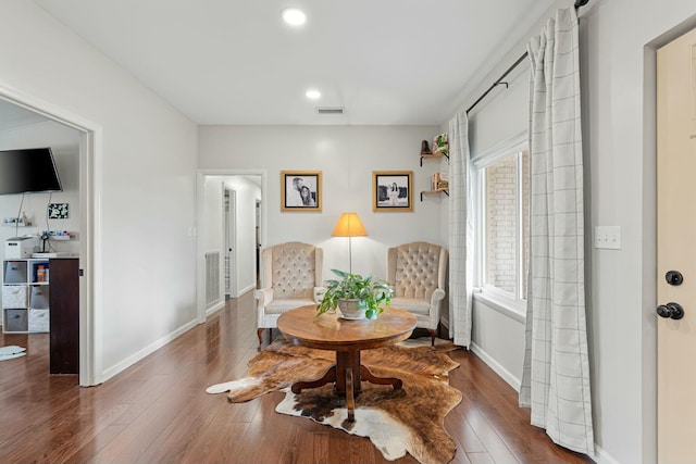 living area with dark wood-type flooring