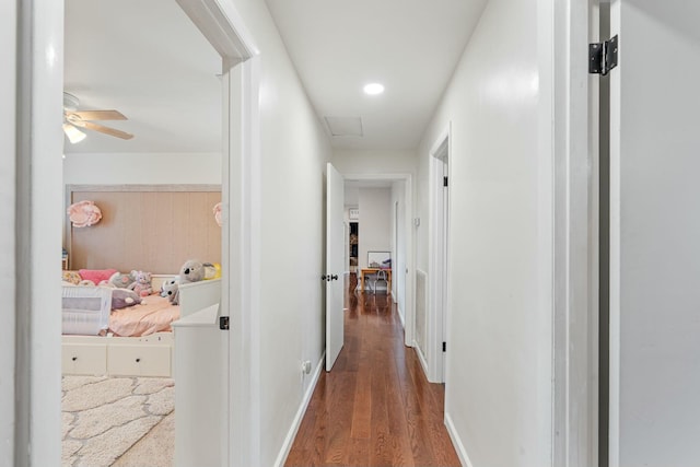 hallway featuring hardwood / wood-style floors