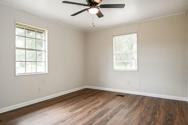1132 Eldredge Cir NW, Cleveland, TN 37312 - unfurnished room featuring dark wood-style flooring, baseboards, ornamental molding, and ceiling fan