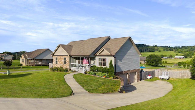 7083 Blue Springs Rd SE, Cleveland, TN 37311 - view of front of house featuring a garage, concrete driveway, a porch, stone siding, and brick siding