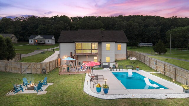 7083 Blue Springs Rd SE, Cleveland, TN 37311 - view of swimming pool with an outdoor fire pit, a patio area, and a fenced backyard